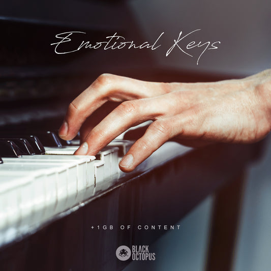 A close up image of a hand playing a chord on a grand piano.